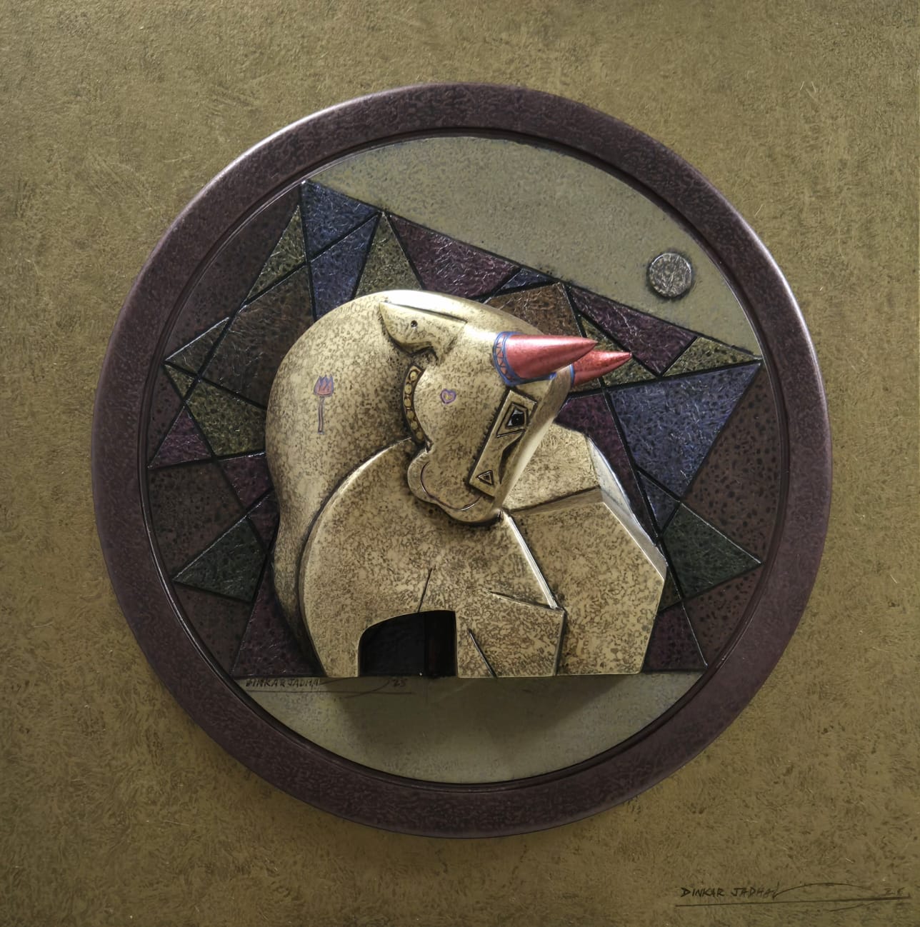 Dinkar Jadhav's 3D circular Nandi wall sculpture; the bull is sculptued in cubism style.