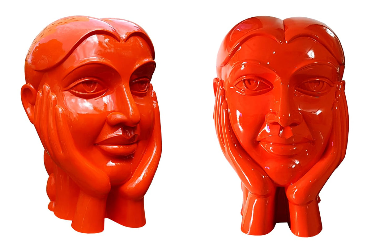 D.V.S. Krishna original 2.5 foot glossy red fiberglass woman portrait sculpture with gentle face and face cupped in both palms. 