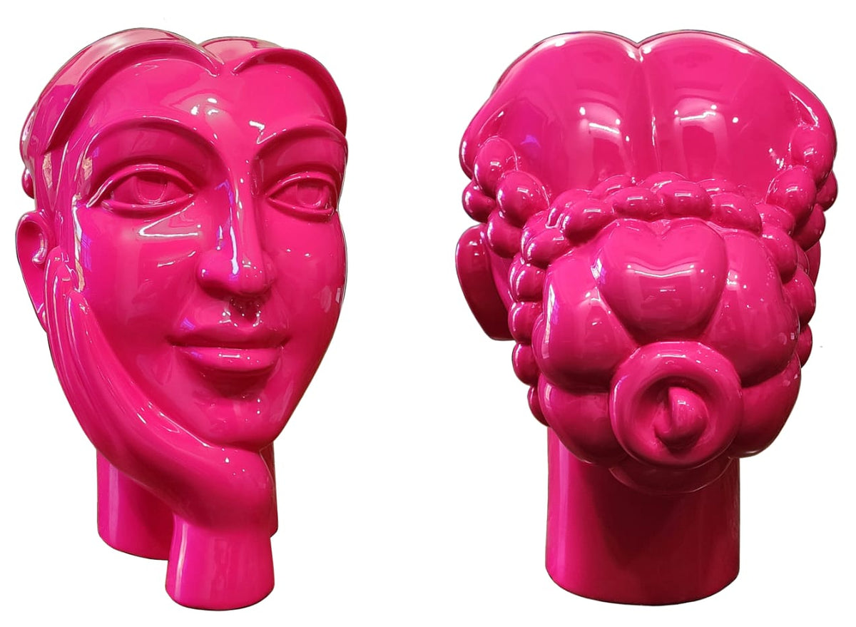 D.V.S. Krishna graceful female face sculpture Silent Grace in neon pink gloss finish. 
