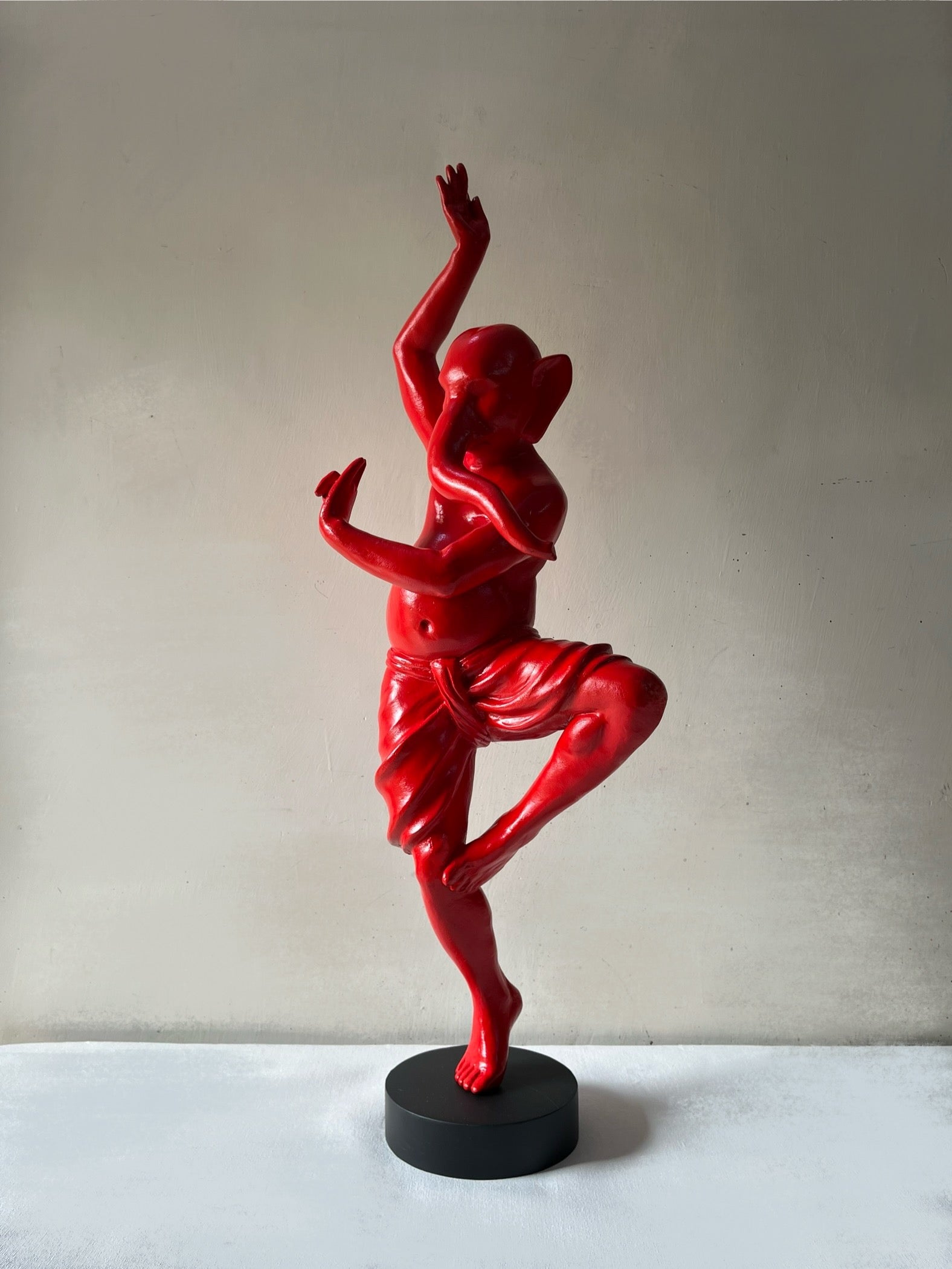 Vernika Singh sculpts a bedazzling red dancing Ganesha from aluminium. 