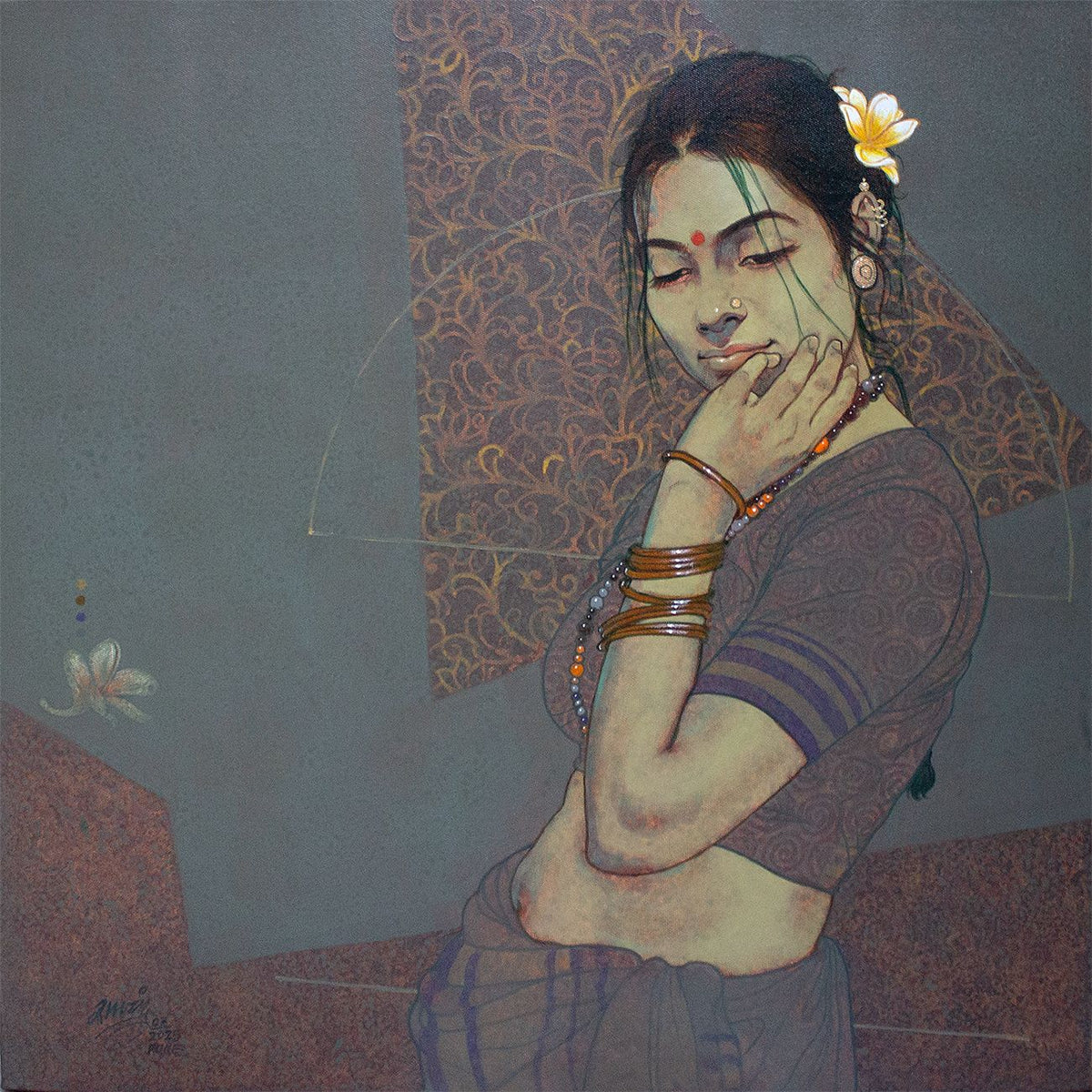 The Indian woman in native attire.