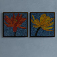Wall display illustration pic of set of two floral paintings. Two framed paintings of red and yellow lotus flowers on a blue wall.