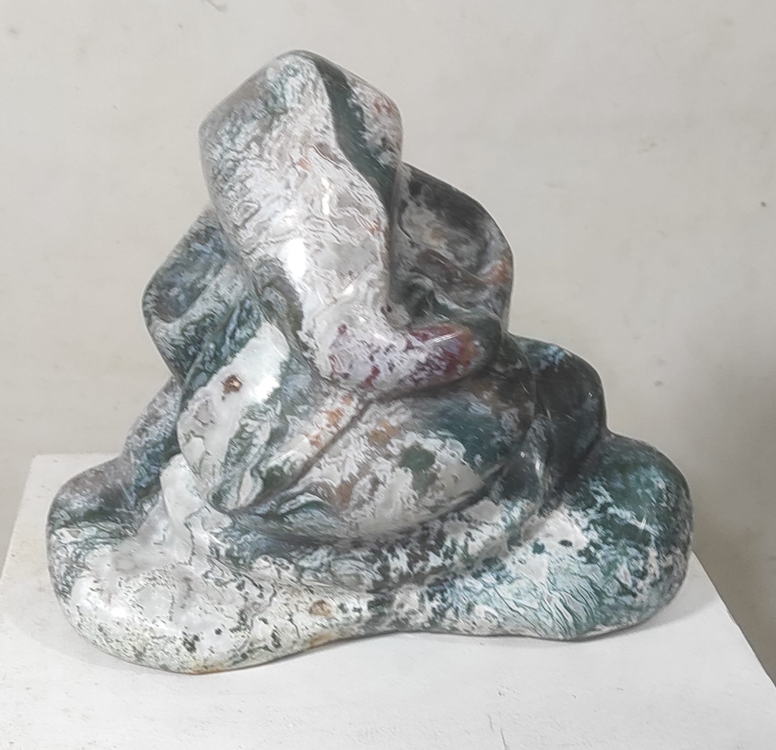Hand-carved seated Lord Ganesha  sculpture made of Agate stone by Ram Bali Prajaati.