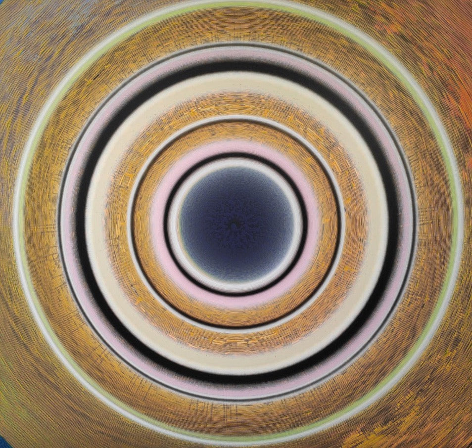 Meditative black and golden hued circles form an optical illusion. Meditative black hole by artist Ghanshyam Gupta