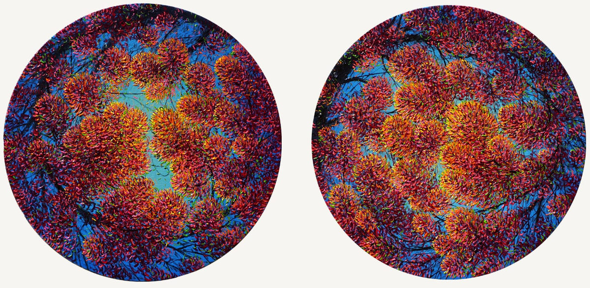 Nature landscape art set of two circular paintings with golden pink tree blossoms.