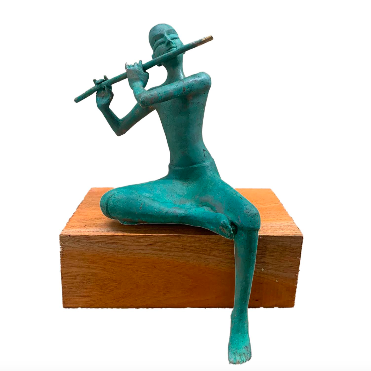 Krishna playing his flute. Sculpture by P. Gnana