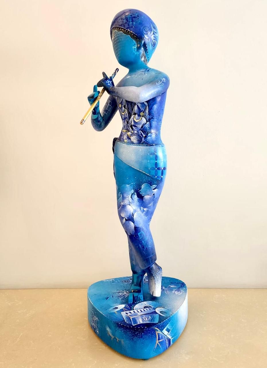 Swati Pasari  large fiberglass Krishna sculpture playing flute; luxury decor.