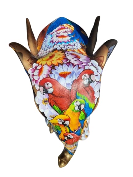 Gold base tone elephant fiberglass sculpture by Sachindra Nath Jha has Parakeets painted on top of the body and on trunk area.