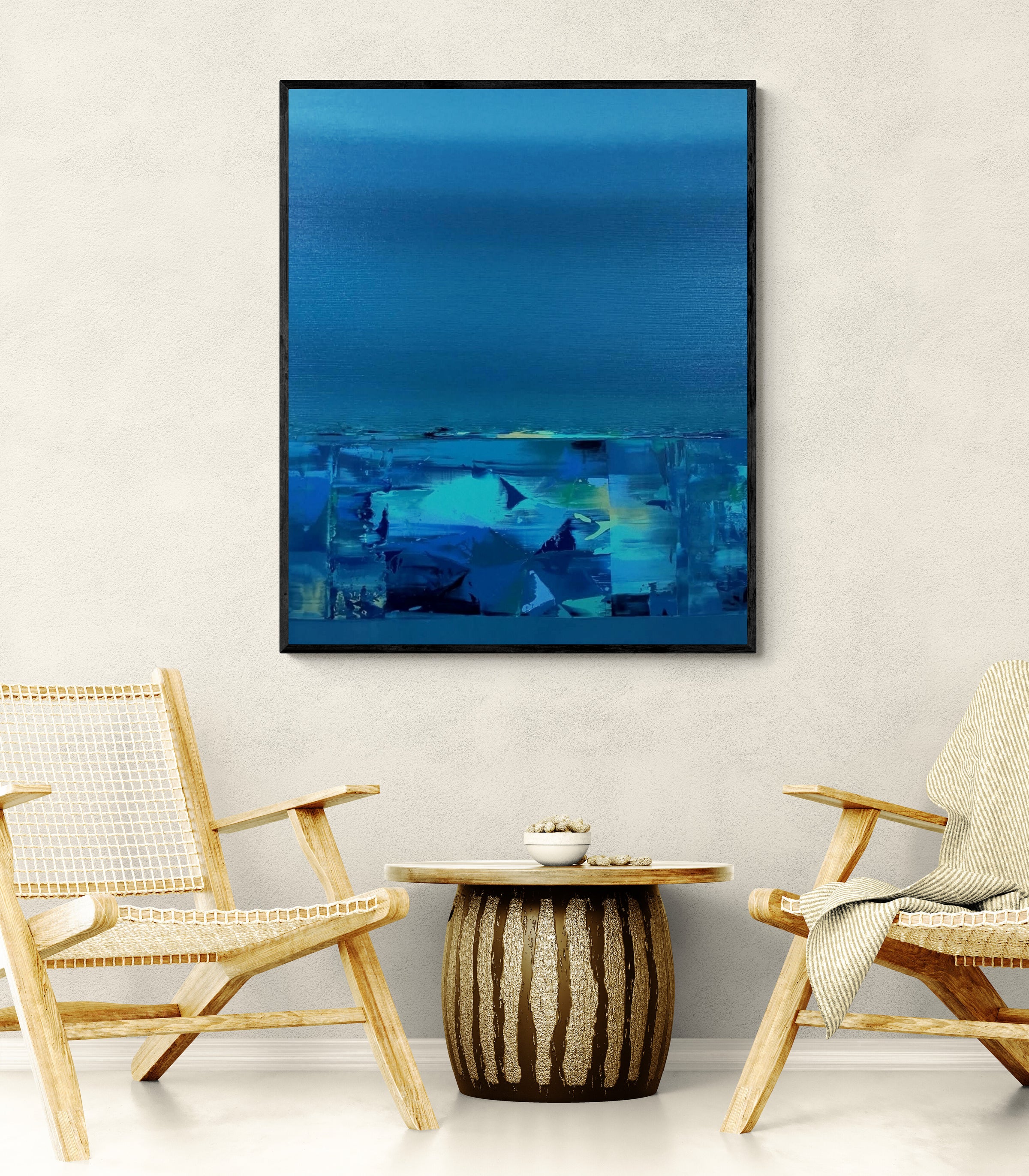 Large-format vertical blue abstract canvas painting by Nivas Kanhere styled on a modern space wall.