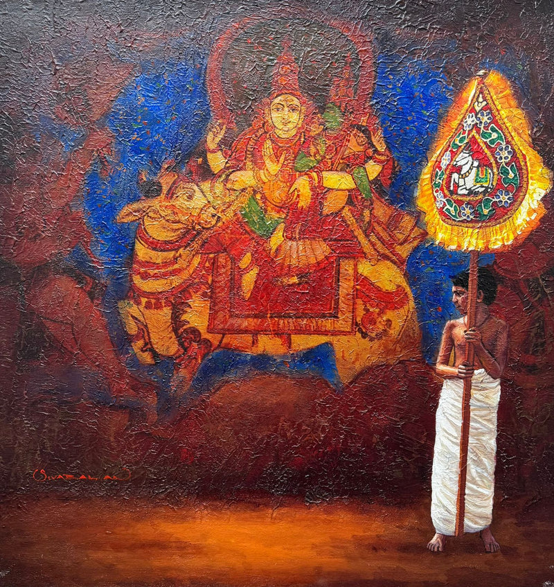 The wall mural of worshiped Goddess forms a rich background as a young boy takes part in religious ceremonies dressed in traditional attire.