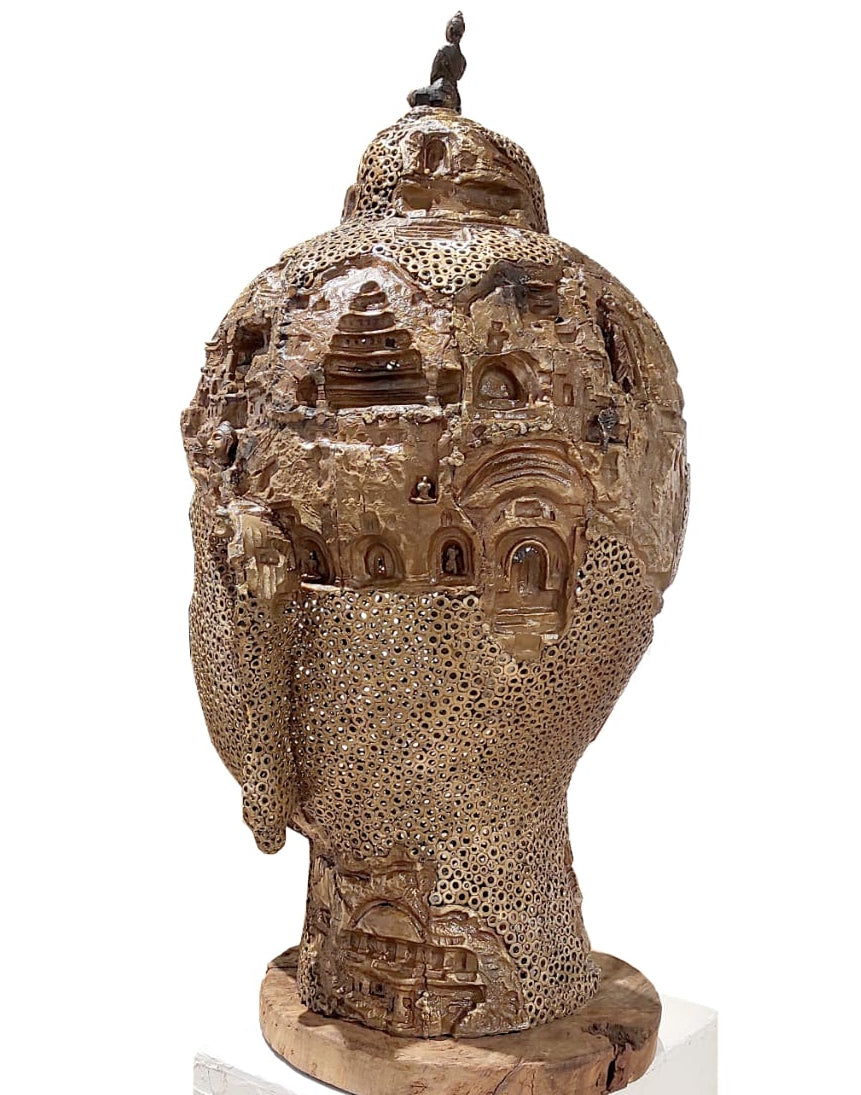 Pintu sikder's Buddha Face brass sculpture; backside shot of details. 