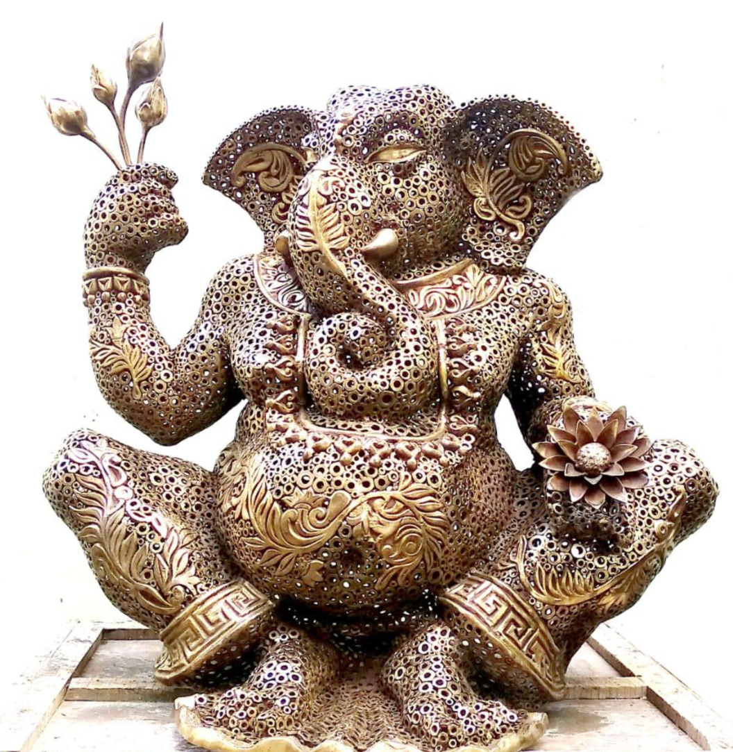 Handcrafted seated Lord Ganesha brass sculpture made from welded industrial bolts.