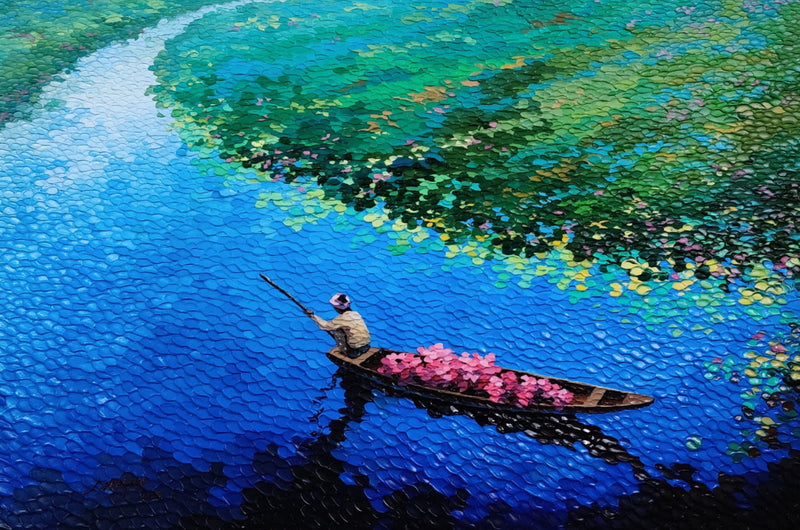 Framed artwork of a man in a boat on a river with lotus flowers. Pallete knife painting.