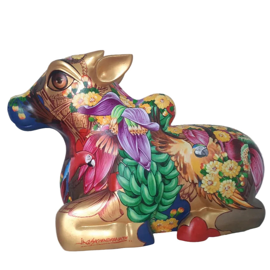 A hand-painted nandi fiberglass sculpture painted  with colorful floral and bird motifs. Sachindra Nath Jha sculpture
