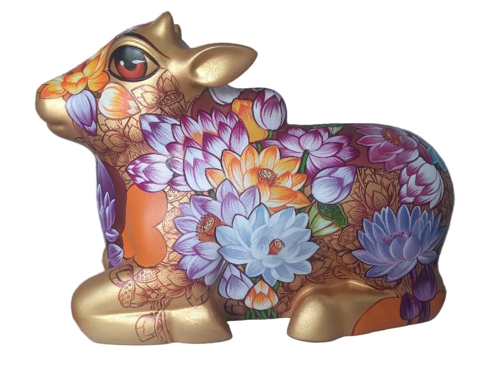 Side view of large decorative Nandi fiberglass sculpture by Sachindra Nath Jha; the bull is painted in colorful flora and folk-art back patterns