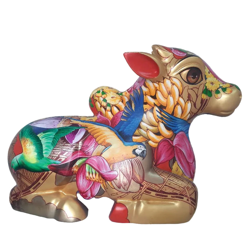 Limited edition sculpture - gold tone Nandi fiberglass sculpture by Sachindra Nath Jha, displaying dense colorful Madhubani flora. Left Side view image.
