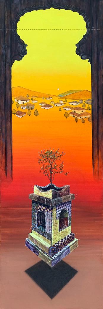 The Tulsi planter vase with a Live Tulsi tree on top against a colourful sunset and village visible in background.