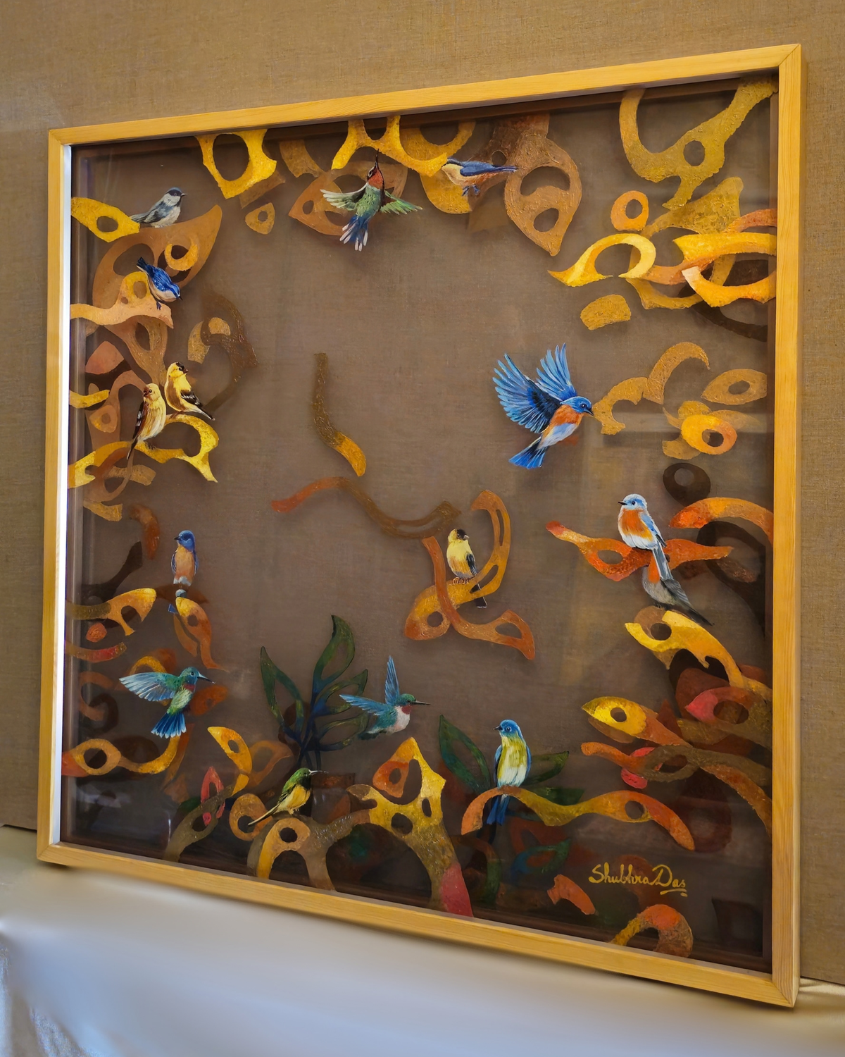 Abstract multilayered nature painting featuring birds and branches - painted on two layered acrylic glass sheets by Shubhra Das. 