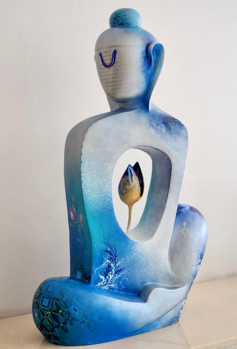 Swati Pasari does a modern , minimalistic and striking rendition of Buddha with this fiber glass sculpture. 