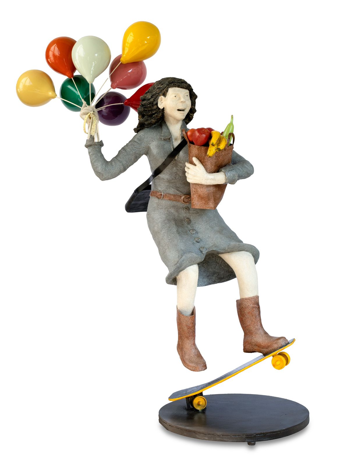 Tapasya Gupta mixed media sculpture of a corporate woman on skates holding balloons - Joy-evoking figurative art for luxury interiors by Artazzle.