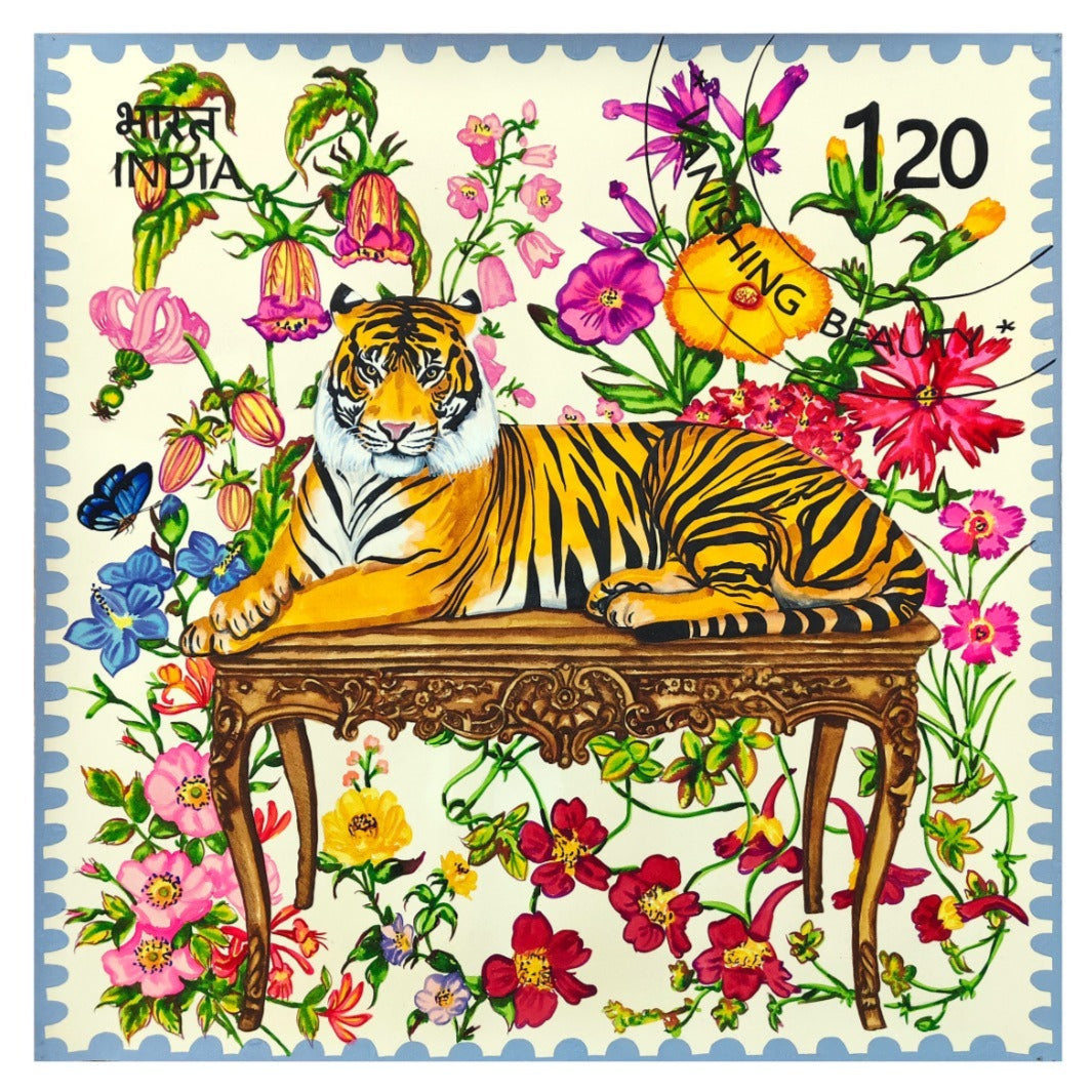 Colorful artwork of a tiger on a bench with flowers, signed by Manisha Agrawal.