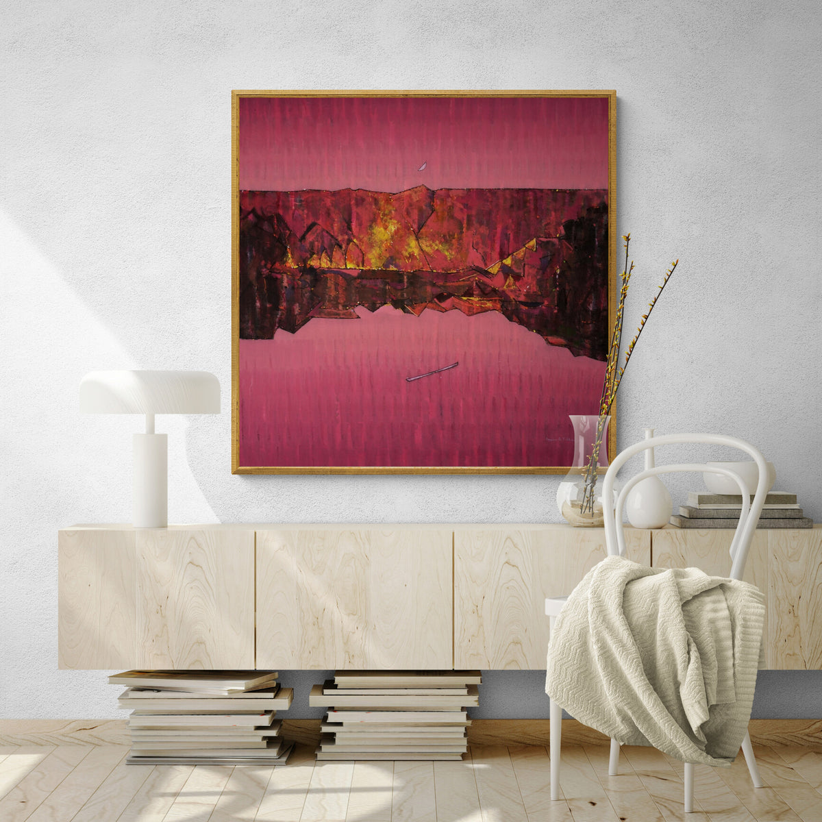 Fine Art in Crimson hues depcits abstract landscape painting by Sanjay Tikkal. Wall display image against white wall in room.
