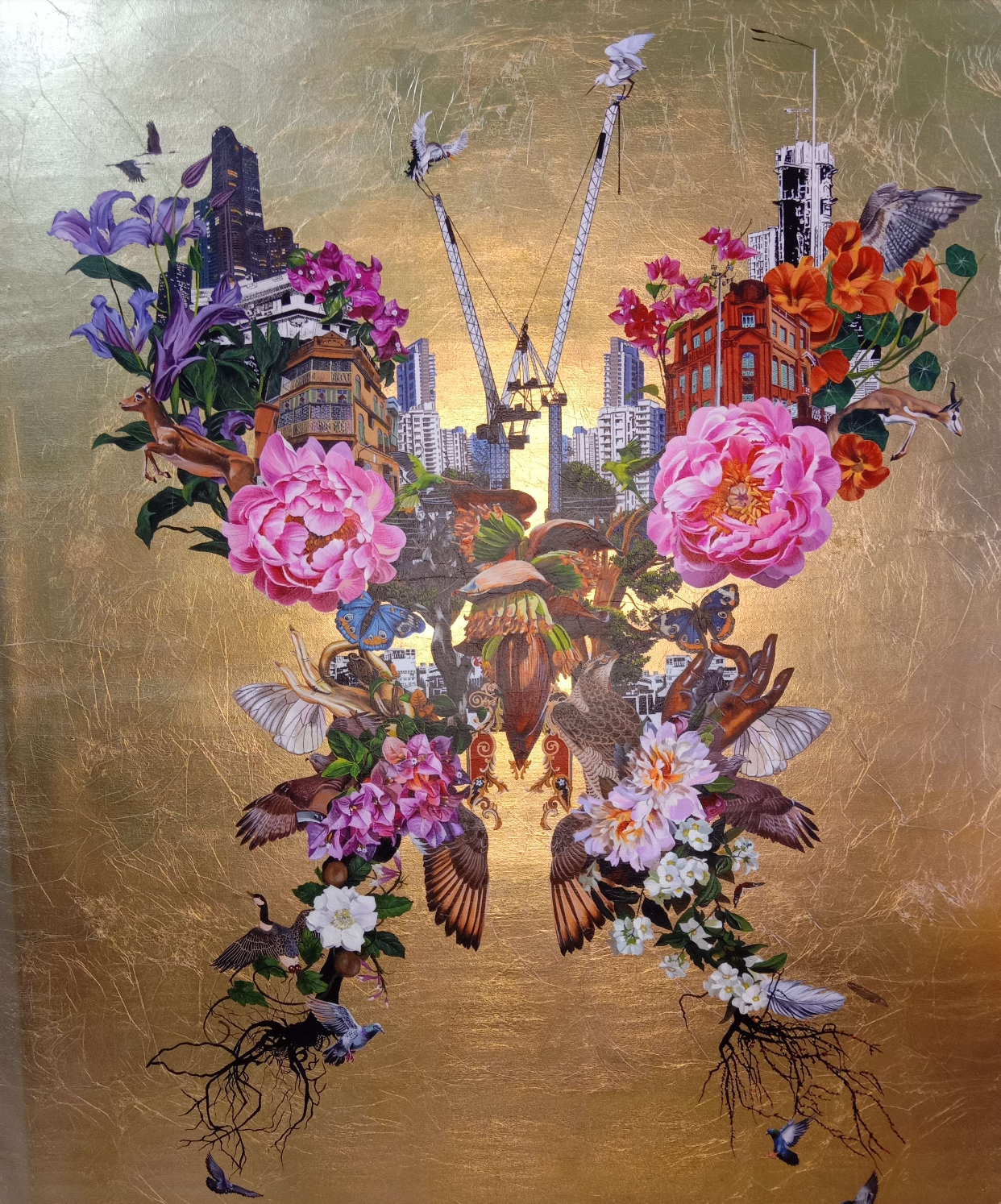 Close up prashant nayak painting flowers, birds, and cityscape on a gold background 