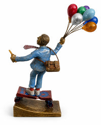 Rear view of  'Thank God It’s Friday' bronze sculpture by Tapasya Gupta featuring man with balloons.